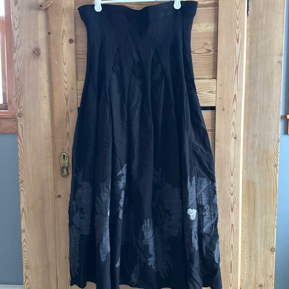 Formal black skirt.  Beautiful floral print on the lower half.